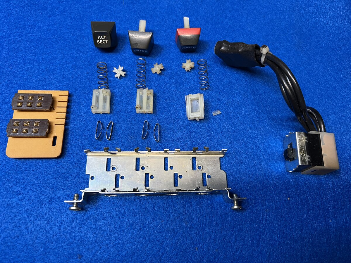 The left switch assembly disassembled
